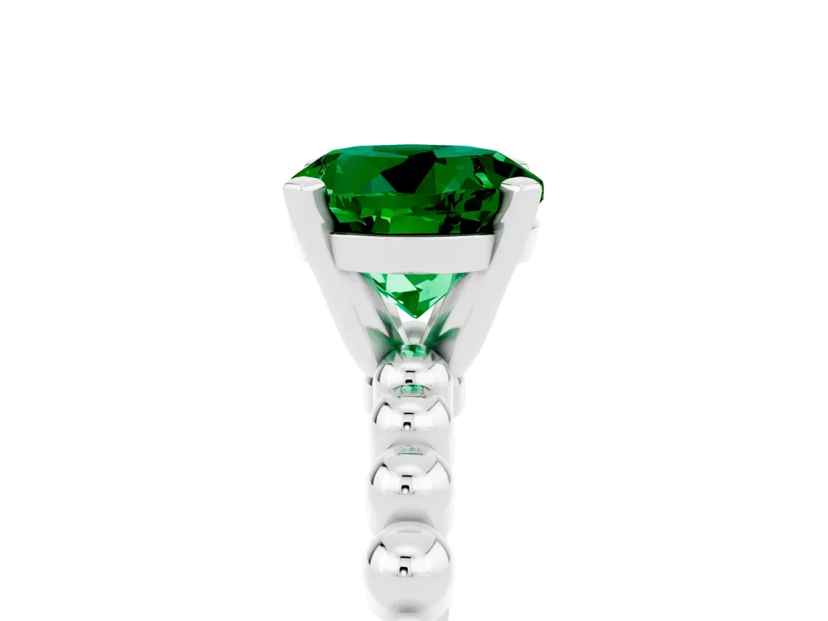 Round Cut Emerald Solitaire Ring with Beaded Band and Prong Setting Silver