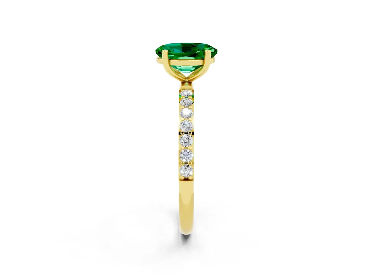 Oval Cut Emerald Solitaire Ring with Round Pavé Band and Prong Setting Yellow gold