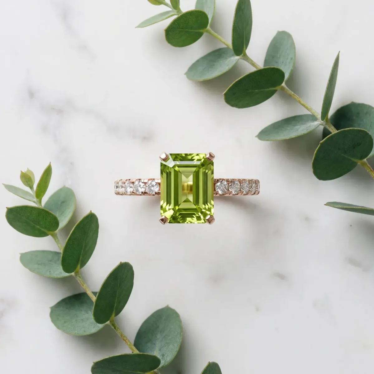 Emerald Cut Peridot Solitaire Ring with Round Pavé Band and Four-Prong Setting Rose gold