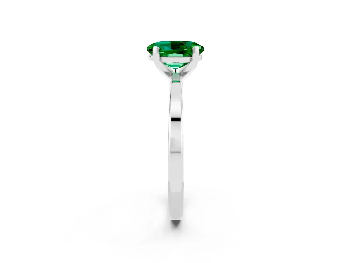 Oval Cut Emerald Solitaire Engagement Ring with Classic Band and Four-Prong Setting Silver