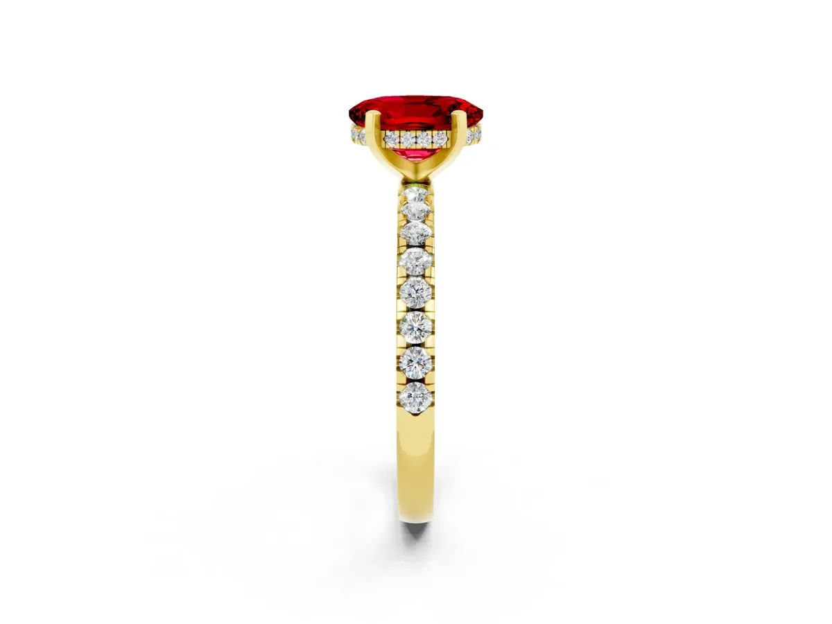 Oval Cut Ruby Solitaire Ring with Round Pavé Band and Four-Prong Setting Yellow gold