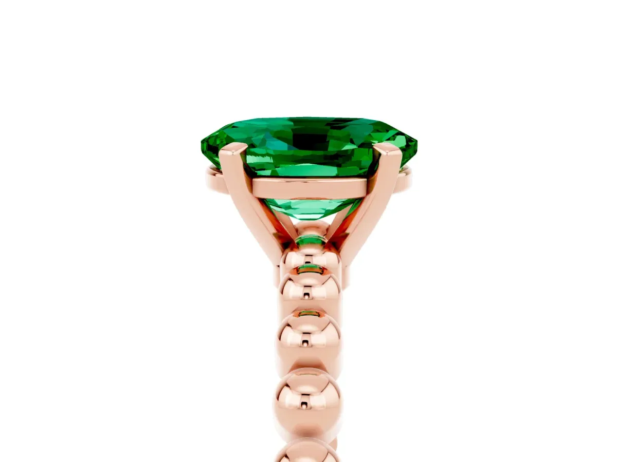 Oval Cut Emerald Solitaire Ring with Beaded Band and Prong Setting Rose gold