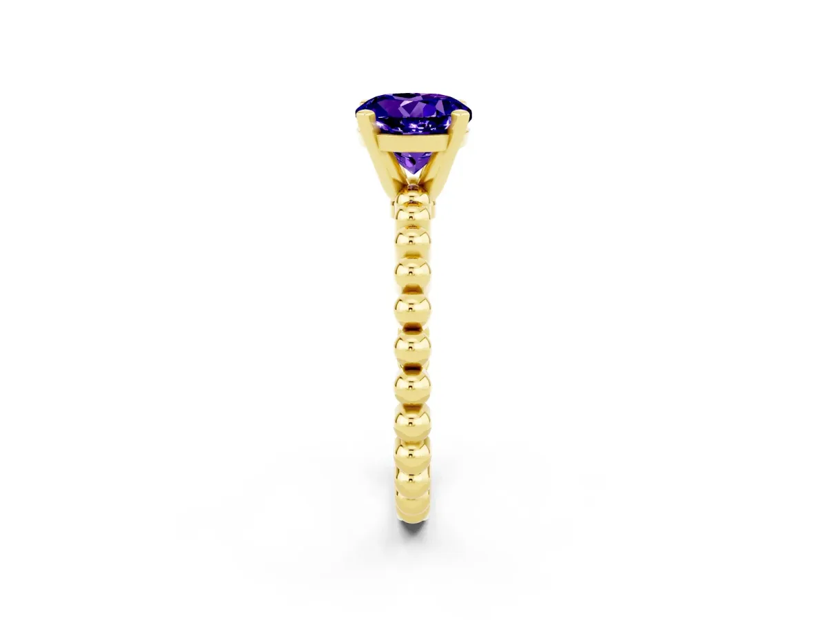 Round Cut Tanzanite Solitaire Ring with Beaded Band and Prong Setting Yellow gold