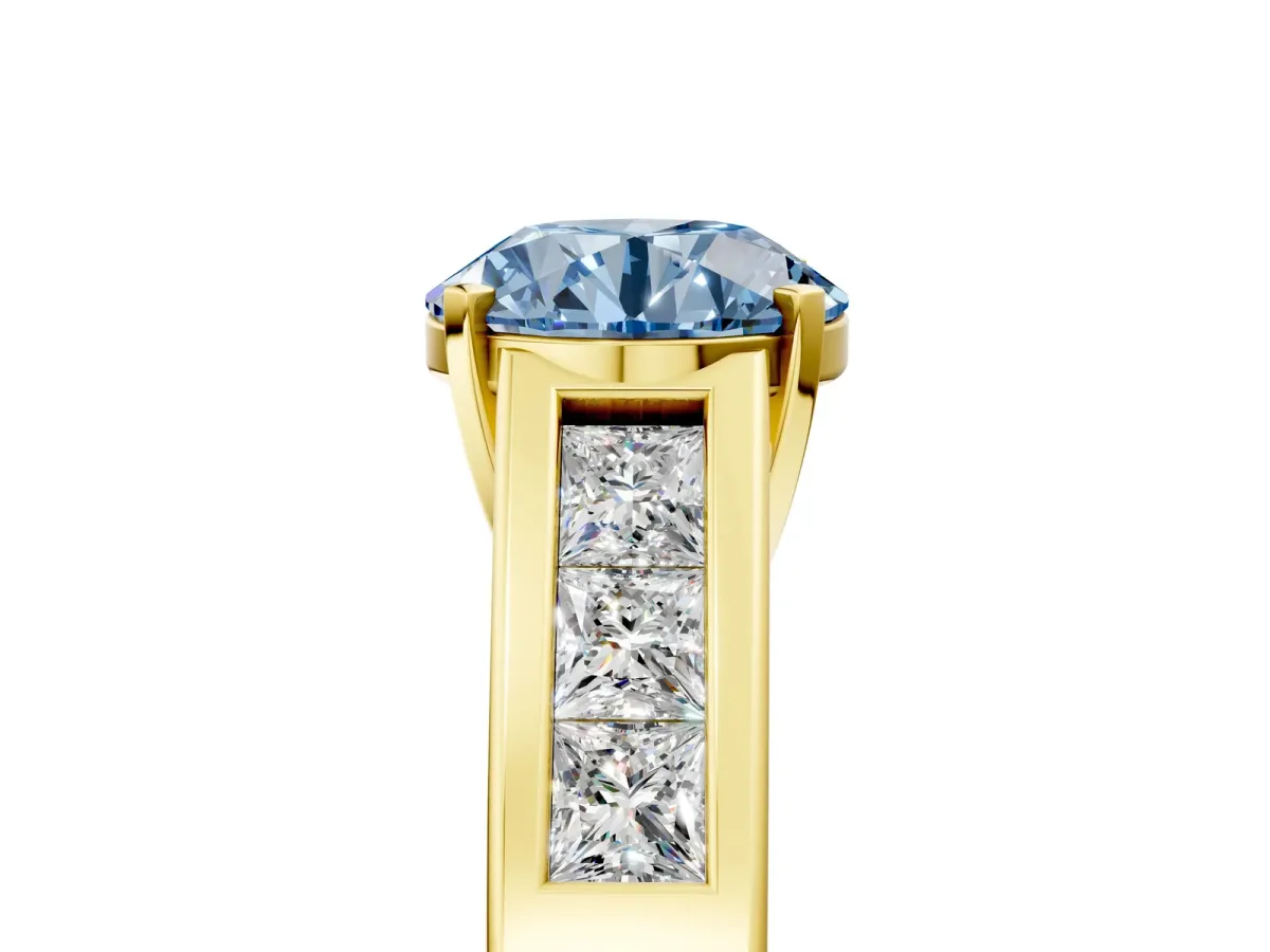Fancy Blue Round Cut Cut Channel Set Solitaire Ring with Four-Prong Setting Yellow gold