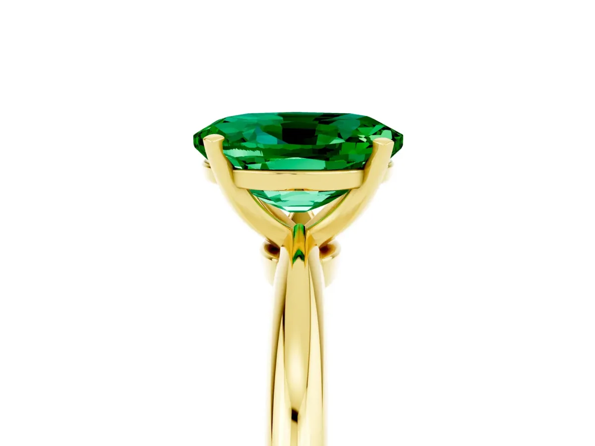 Oval Cut Emerald Solitaire Ring with Six-Prong Setting and Classic Band Yellow gold