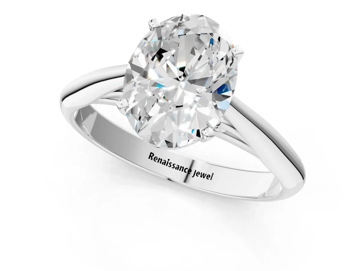 Oval Cut Diamond Solitaire Engagement Ring with Cathedral Setting and Four-Prong Mount White gold