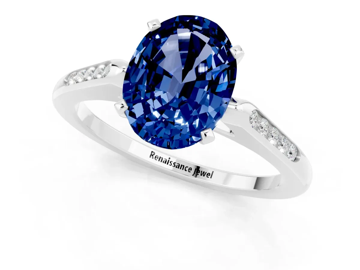 Oval Cut Blue Sapphire Solitaire Ring with Channel Set Round Band and Prong Setting Silver
