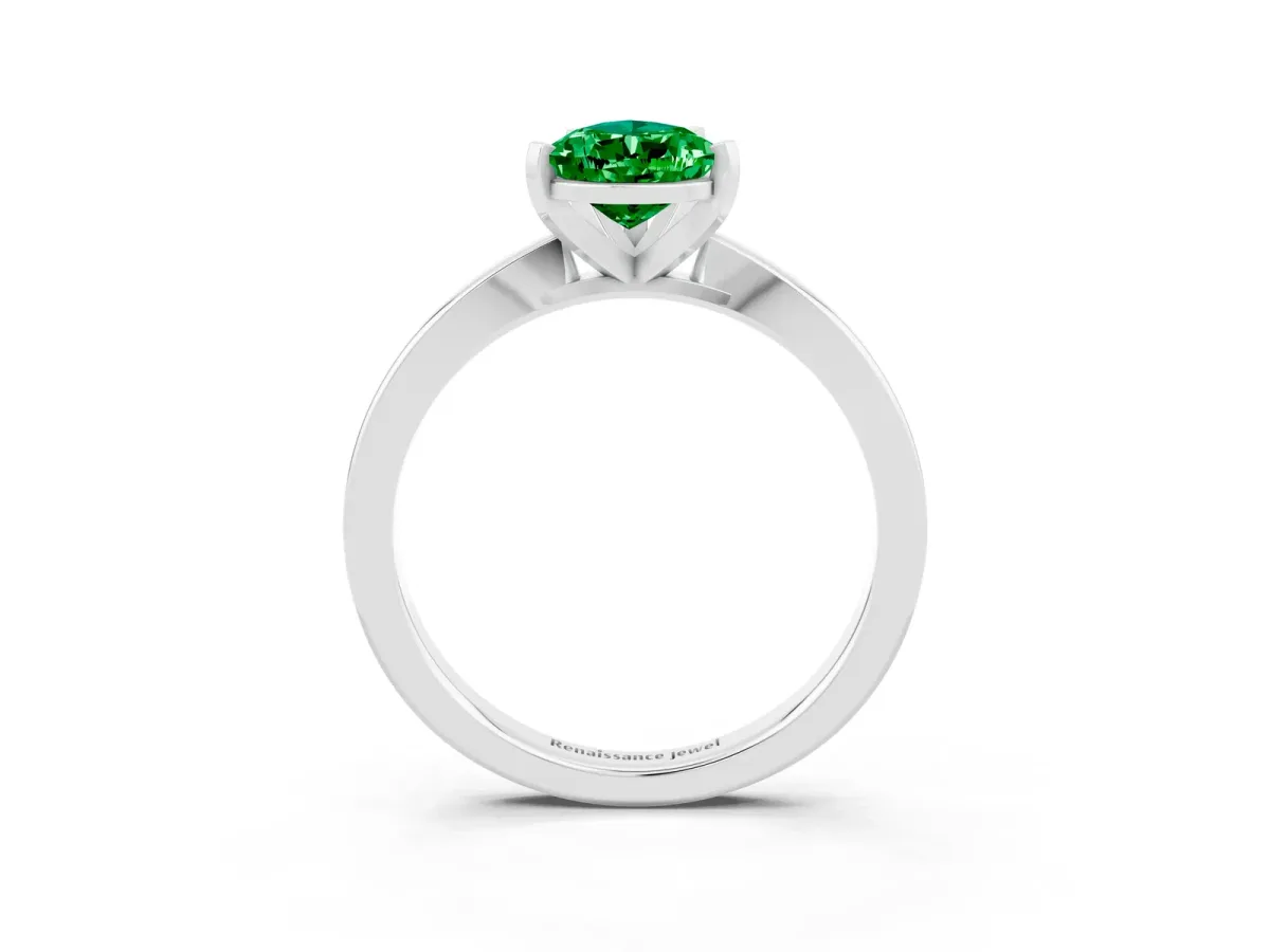 Pear Cut Emerald Solitaire Engagement Ring with Classic Band and Four-Prong Setting Silver