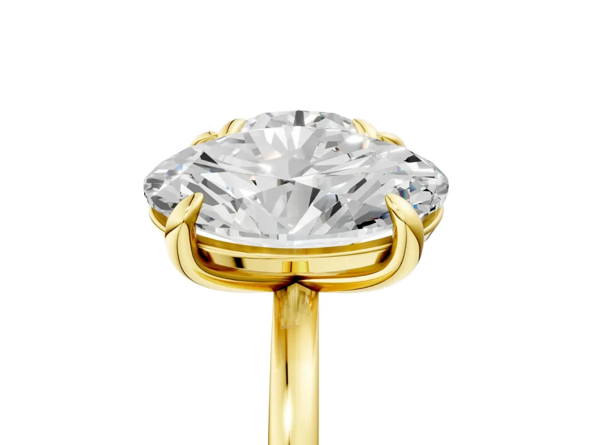 Round and Oval Toi Moi Ring with Prong Setting and Plain Band Yellow gold
