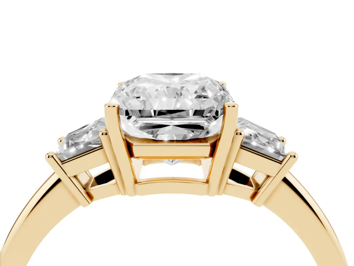 Radiant Cut Diamond Three-Stone Ring with Trapezoid Side Stones and Prong Setting Yellow gold