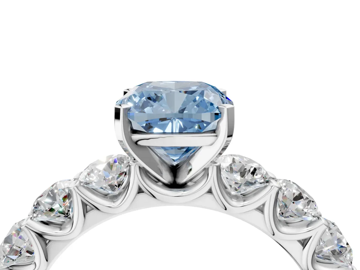 Fancy Blue Cushion Cut Diamond Prong Setting with Side Stones on a Pave Band Silver