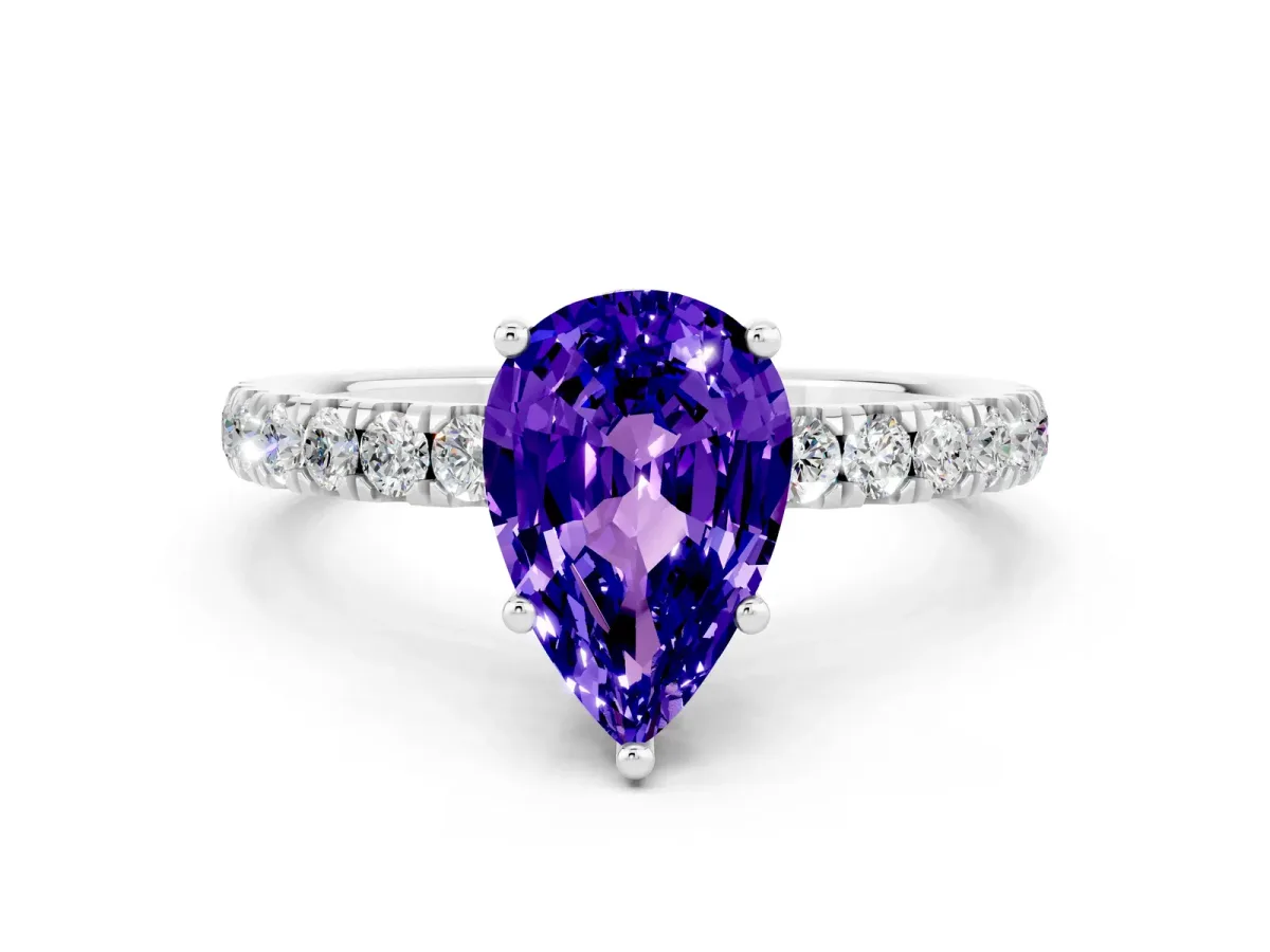 Pear Cut Tanzanite Pave Band Solitaire Ring with Round and Prong Setting Platinum