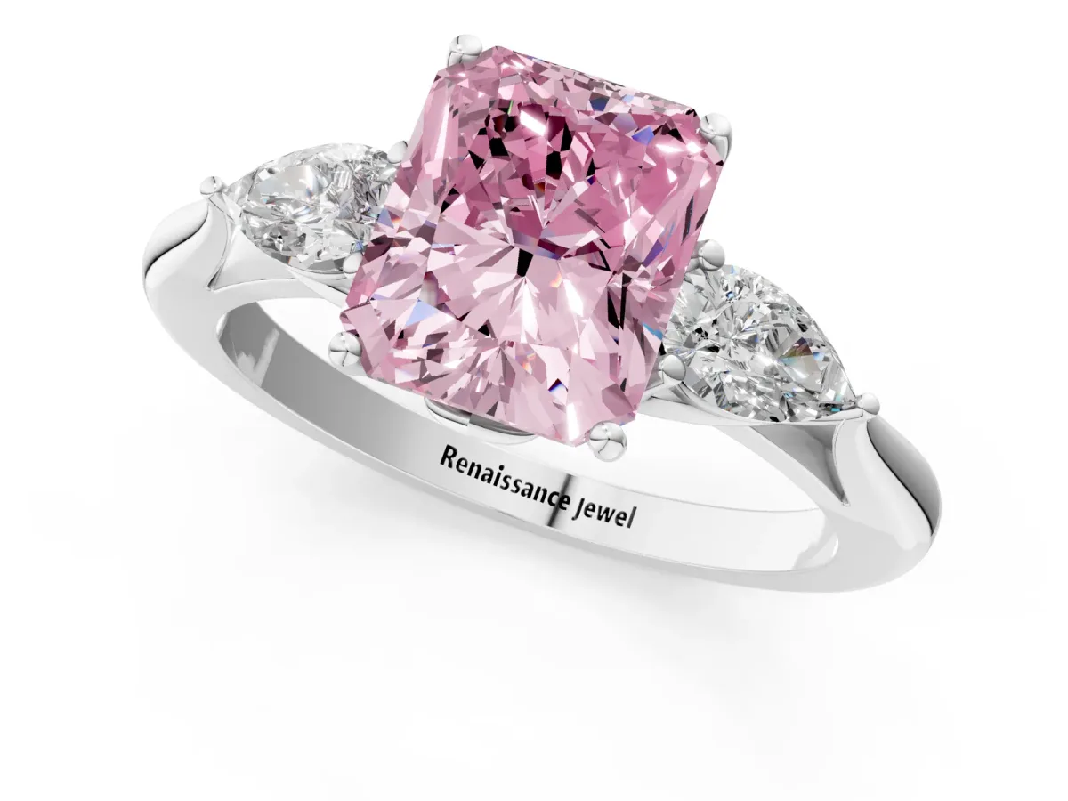 Fancy Pink Three-Stone Radiant Cut Diamond Ring with Pear Side Stones in Four-Prong Setting Platinum