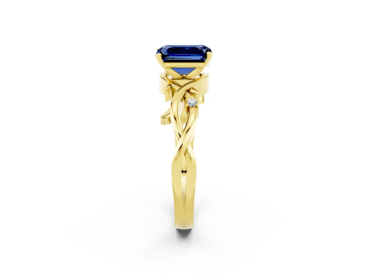 Emerald Cut Blue Sapphire Solitaire Ring with Twisted Band and Prong Setting Yellow gold