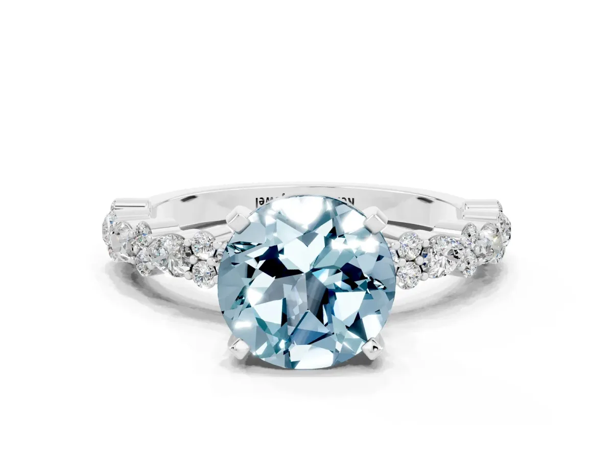 Round Cut Aquamarine Side Stone Solitaire Ring with Round and Four-Prong Setting Platinum
