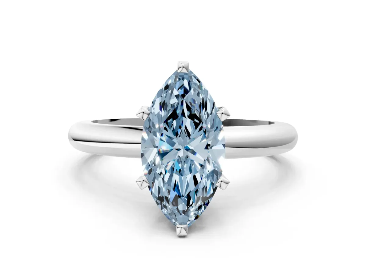 Fancy Blue Marquise Cut Diamond Solitaire Engagement Ring with Round Band and Four-Prong Setting Silver