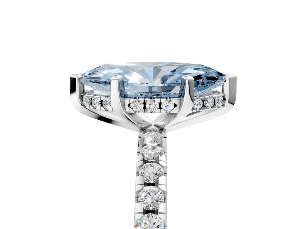 Fancy Blue Marquise Cut Diamond Solitaire Ring with Round Pavé Band and Four-Prong Setting Silver