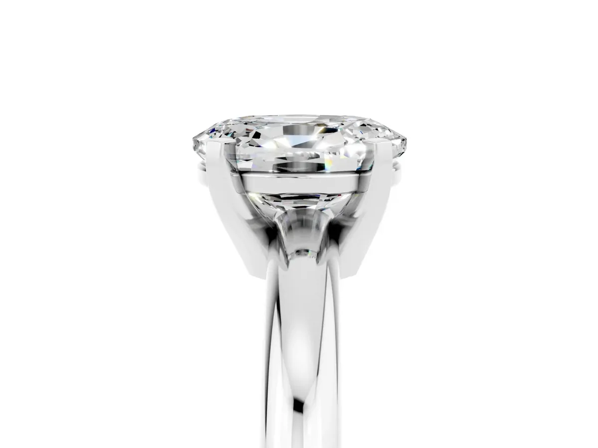 Oval Cut Moissanite Solitaire Engagement Ring with Round Band and Four-Prong Setting Silver