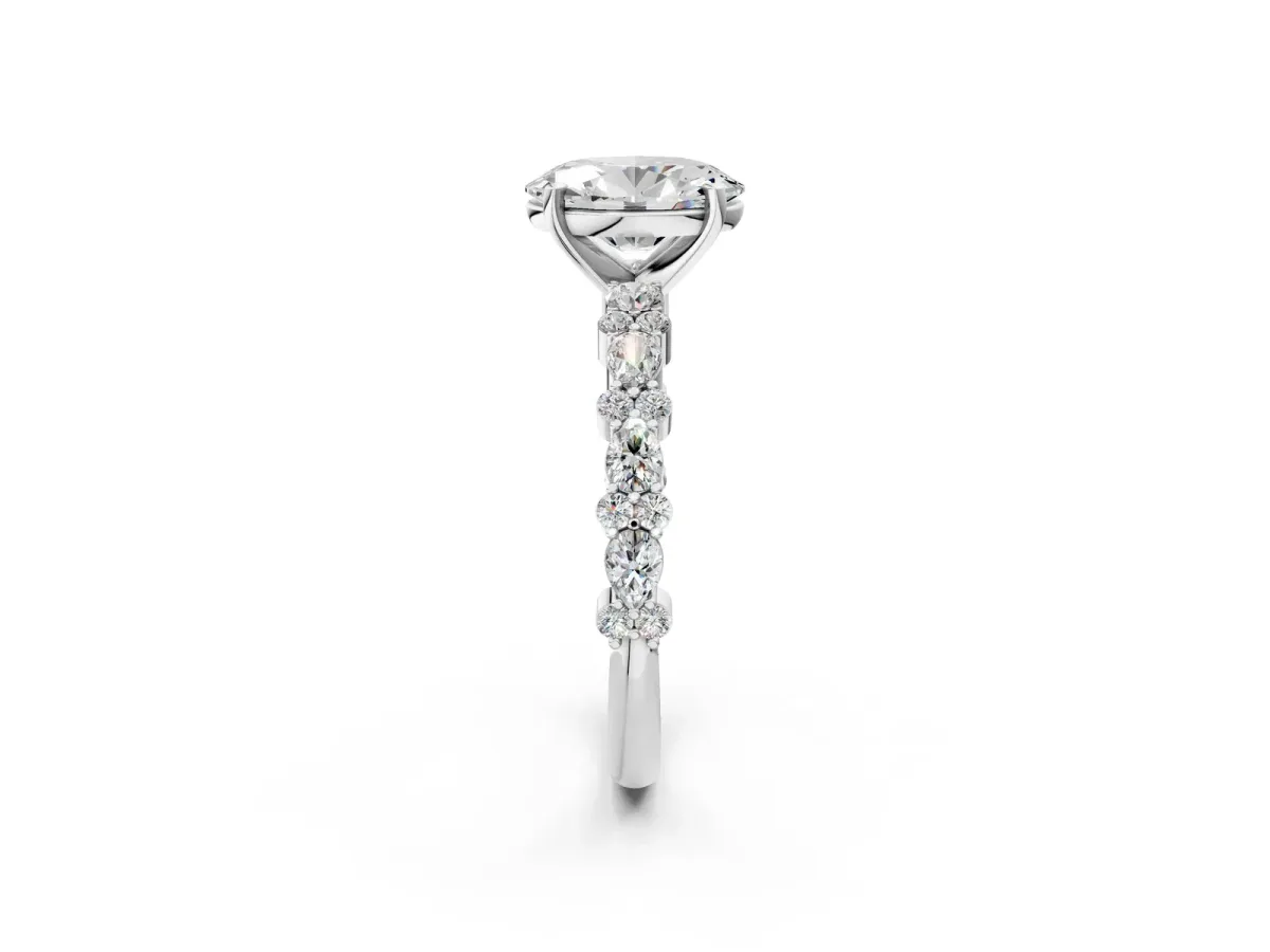 Oval Cut Diamond Side Stone Solitaire Ring with Round and Four-Prong Setting White gold