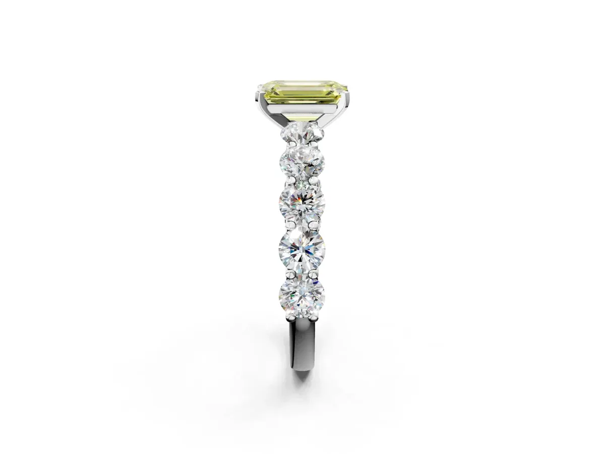 Fancy Yellow Emerald Cut Diamond Prong Setting with Side Stones on a Pave Band Silver