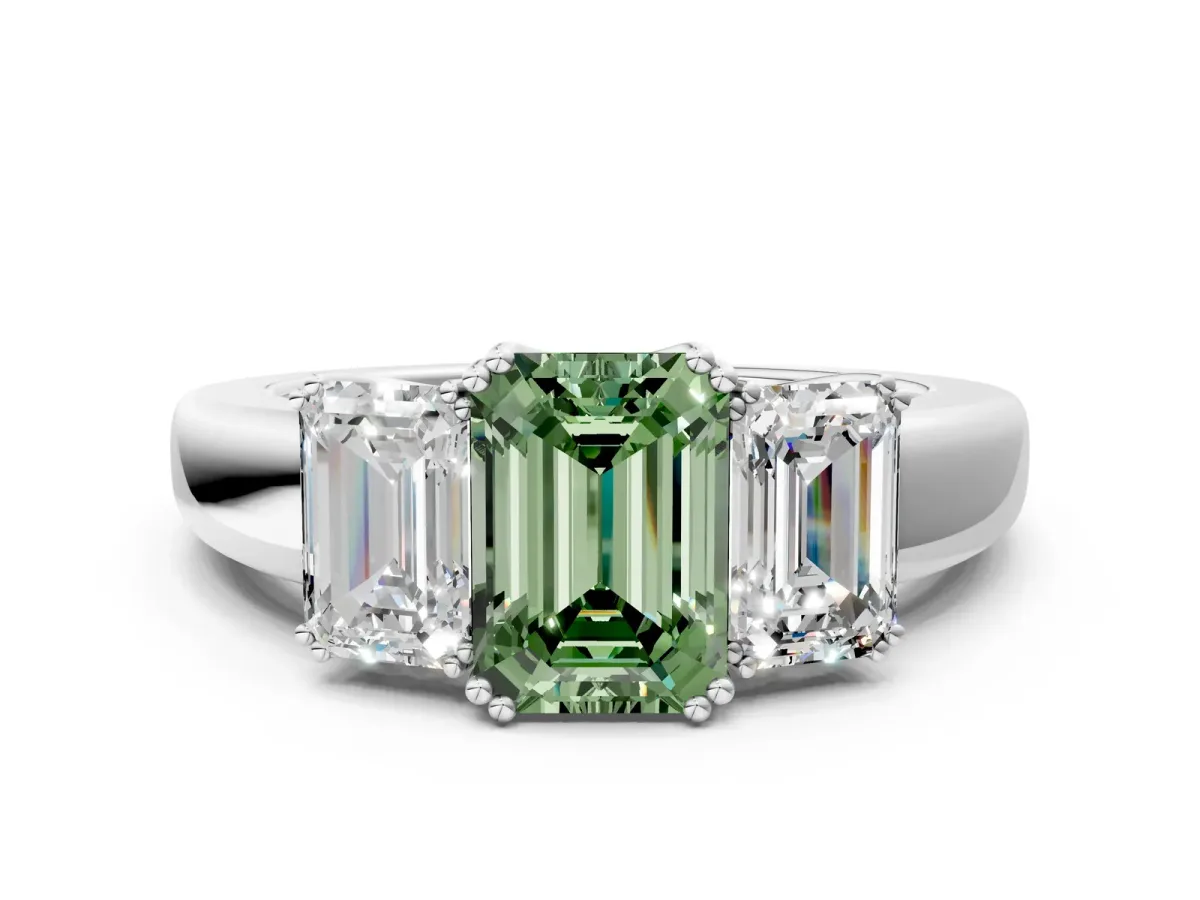 Fancy Green Three-Stone Emerald Cut Cut Diamond Ring with Channel Set Band and Four-Prong Setting Platinum