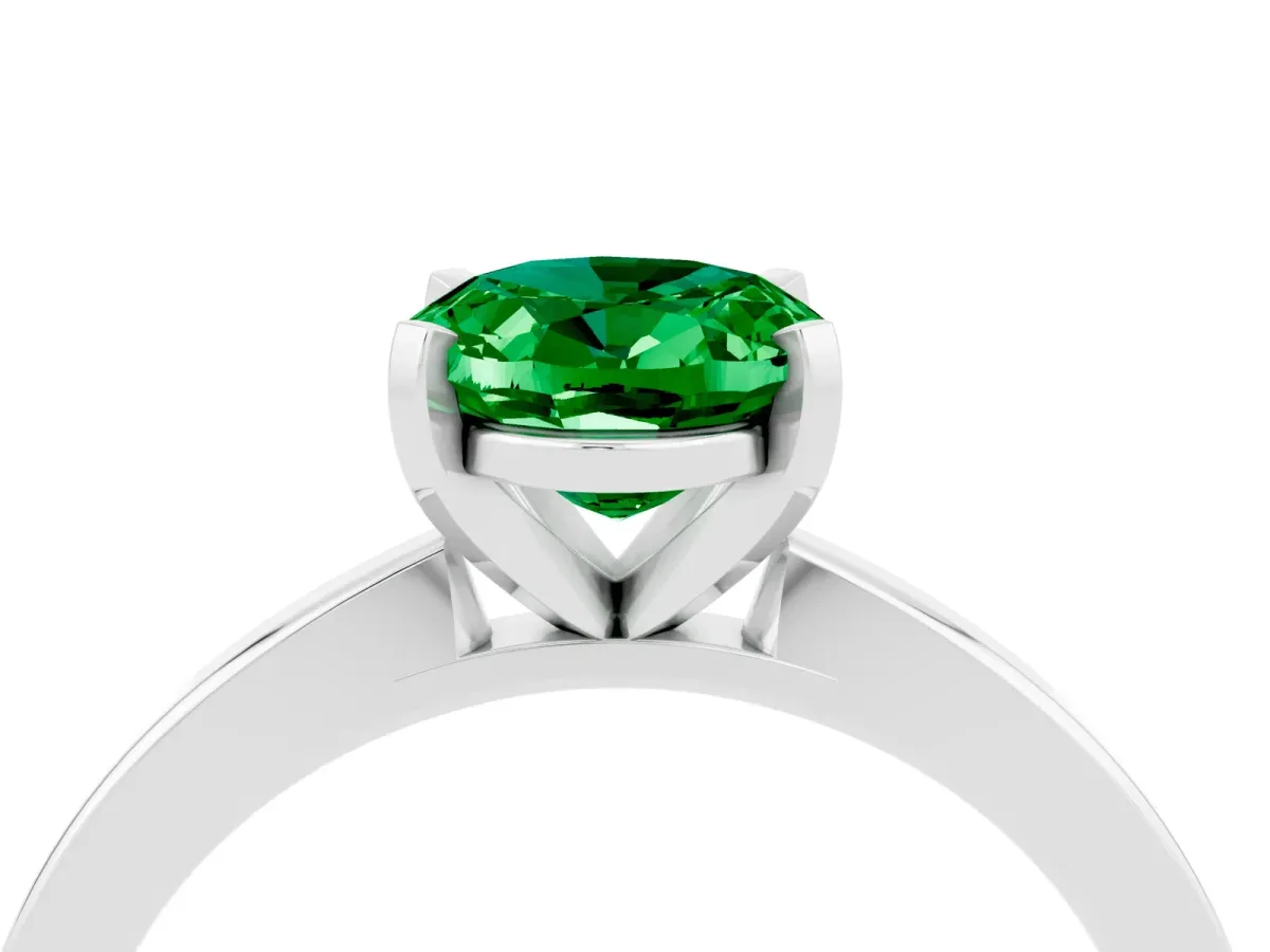 Oval Cut Emerald Solitaire Engagement Ring with Classic Band and Four-Prong Setting Silver