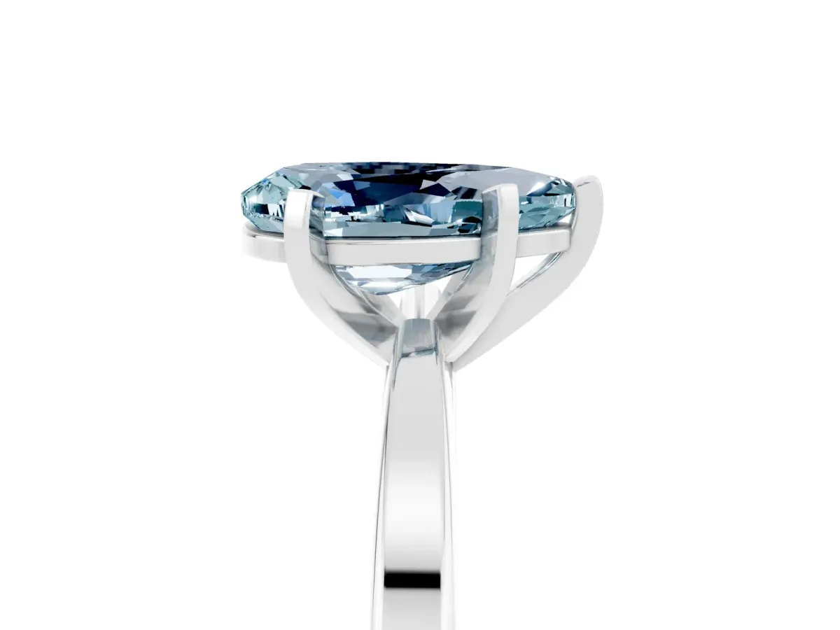 Pear Cut Aquamarine Solitaire Engagement Ring with Classic Band and Four-Prong Setting Silver