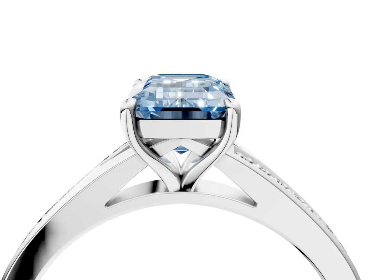 Fancy Blue Emerald Cut Diamond Solitaire Ring with Pavé Band and Prong Setting Silver