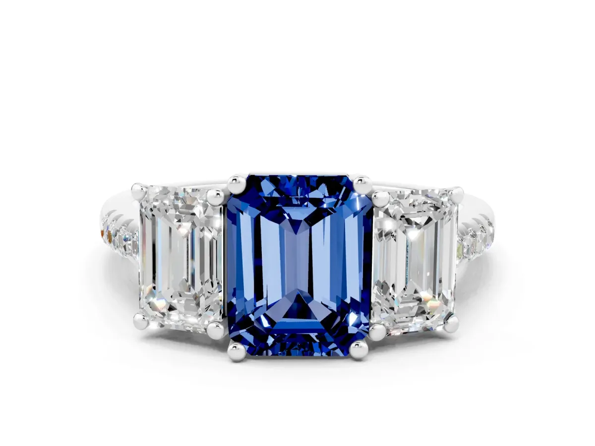 Three-Stone Emerald Cut Blue Sapphire Ring with Round Pavé Band and Prong Setting Platinum