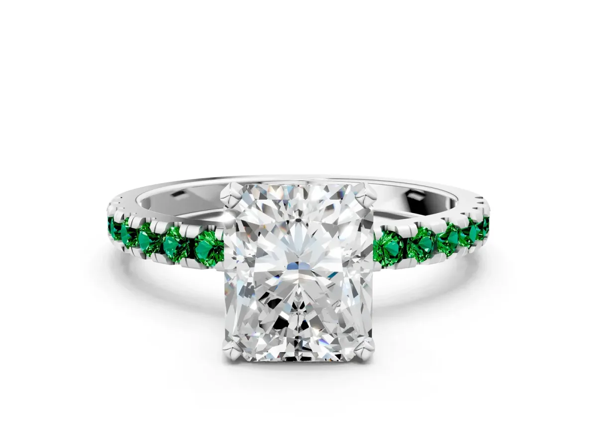 Radiant Cut Diamond Solitaire Ring with Round Emerald Pavé Band and Four-Prong Setting Silver