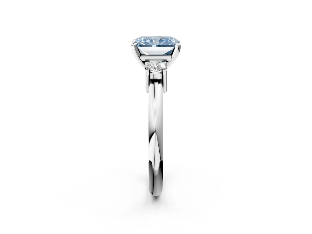Fancy Blue Three-Stone Radiant Cut Cut Diamond Solitaire with Prong Setting and Classic Band Platinum