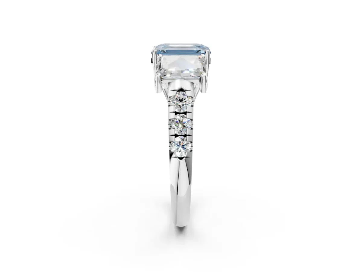 Fancy Blue Three-Stone Emerald Cut Diamond Pavé Band with Prong Setting Platinum