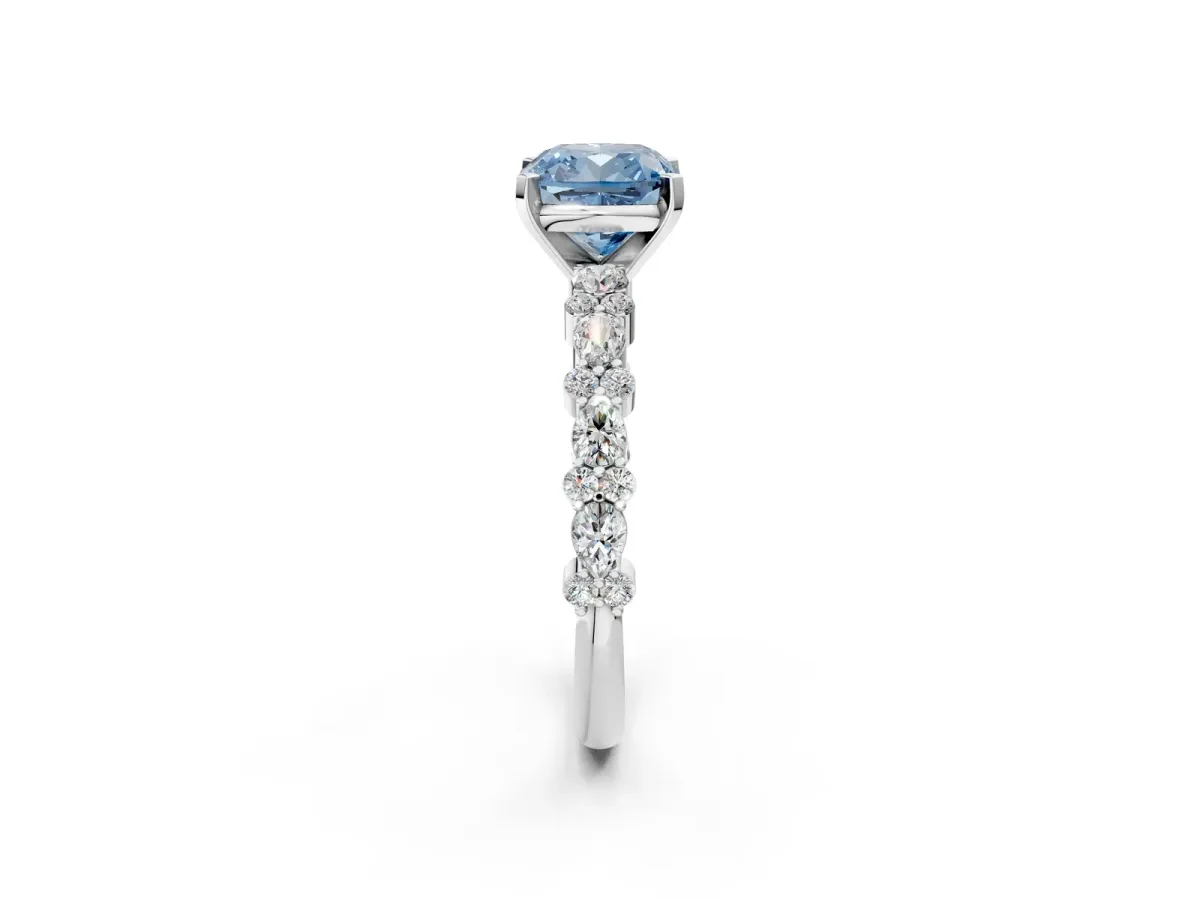 Fancy Blue Cushion Cut Diamond Side Stone Solitaire Ring with Round and Four-Prong Setting White gold