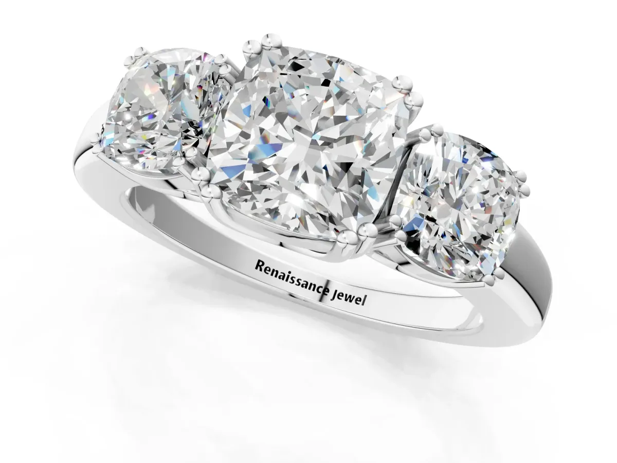 Three-Stone Cushion Cut Cut Diamond Ring with Channel Set Band and Four-Prong Setting White gold