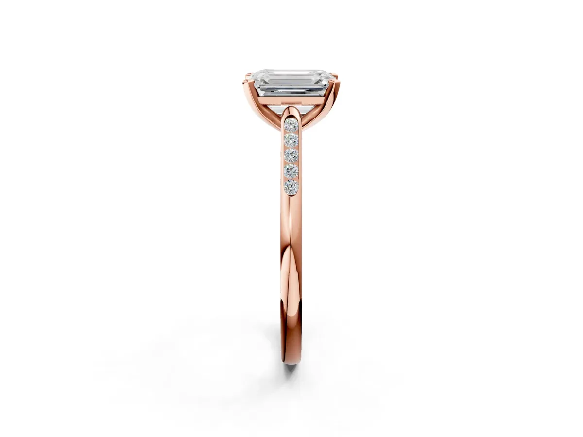 Emerald Cut Diamond Solitaire Ring with Channel Set Round Band and Prong Setting Rose gold