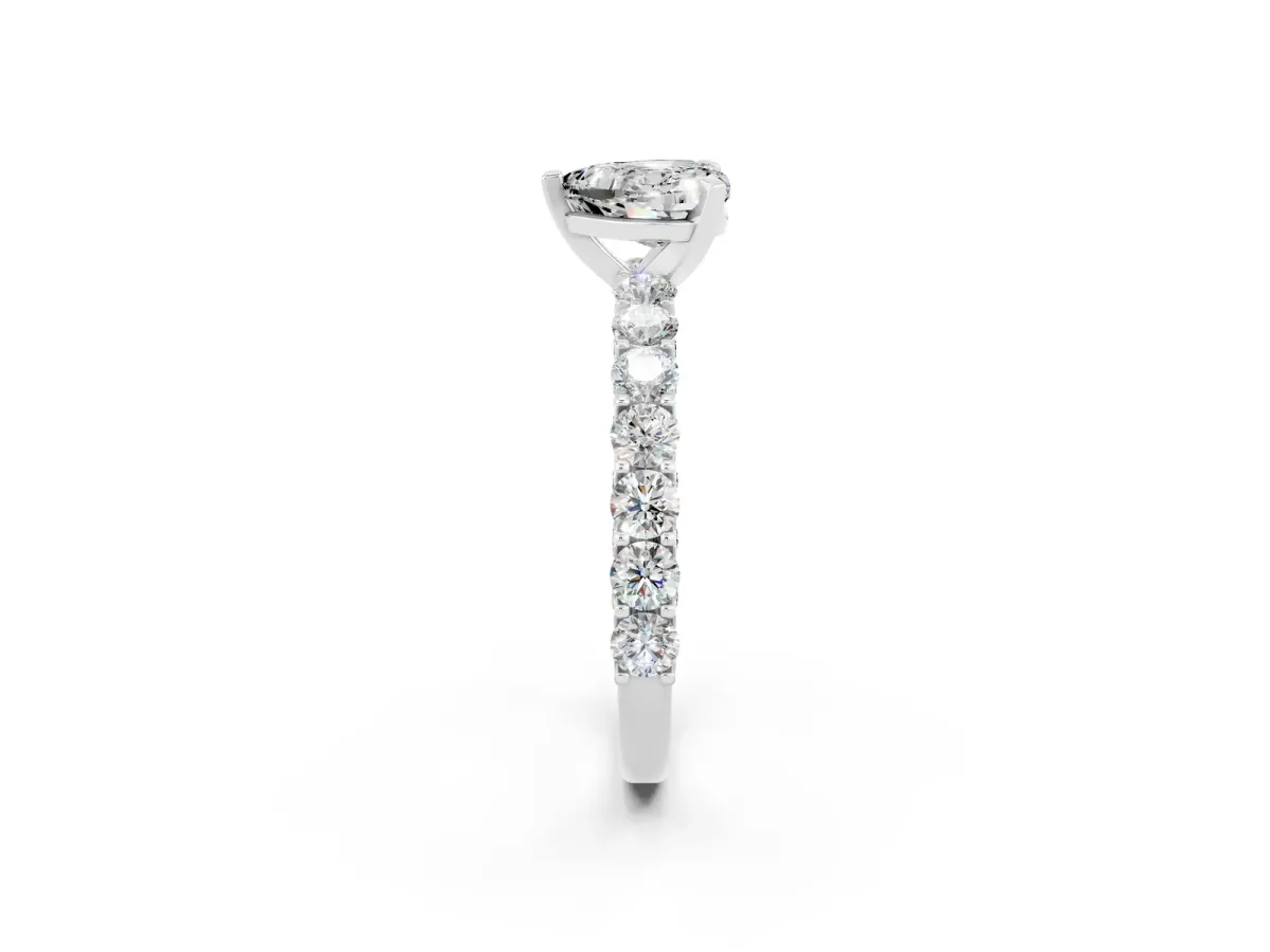 Heart Cut Moissanite Solitaire Ring with Shared Prong Pavé Band and Four-Prong Setting Silver