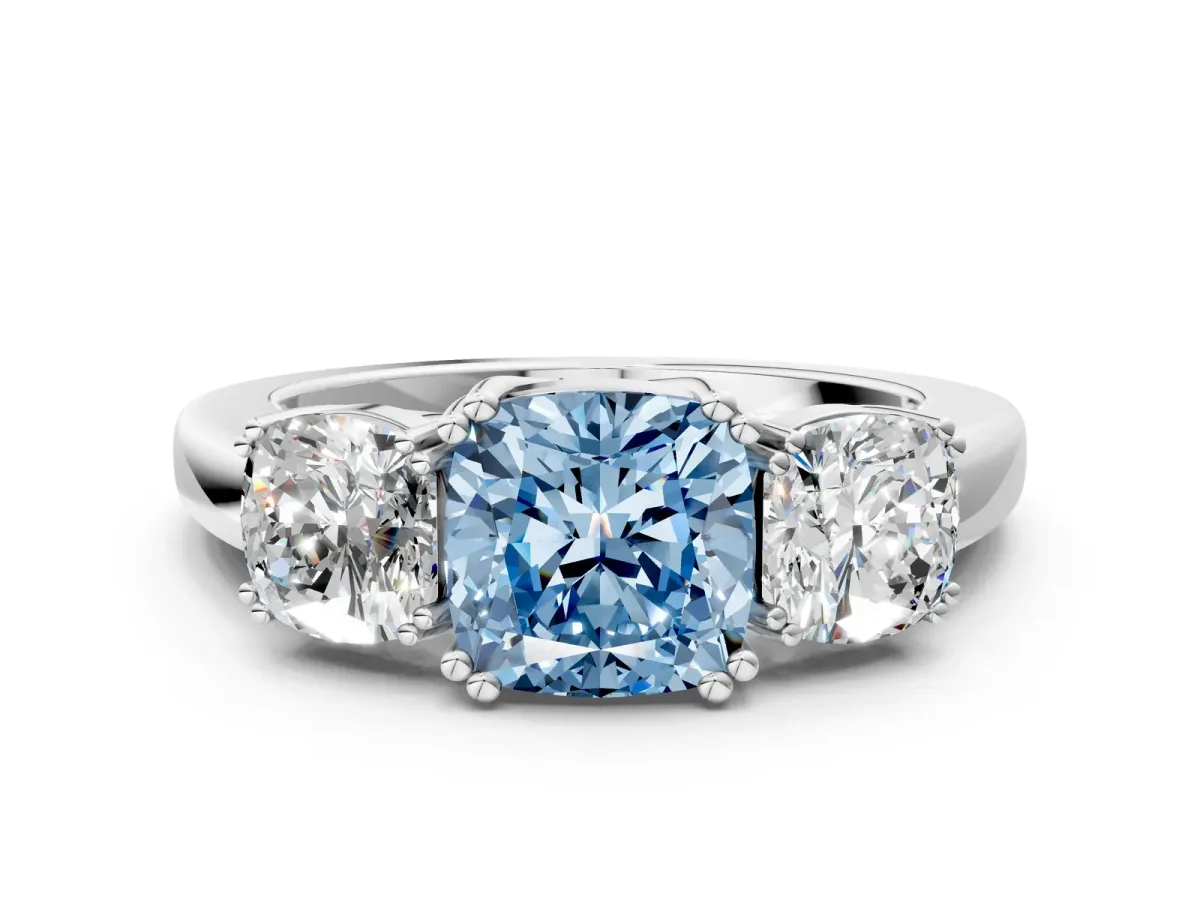 Fancy Blue Three-Stone Cushion Cut Cut Diamond Ring with Channel Set Band and Four-Prong Setting Silver