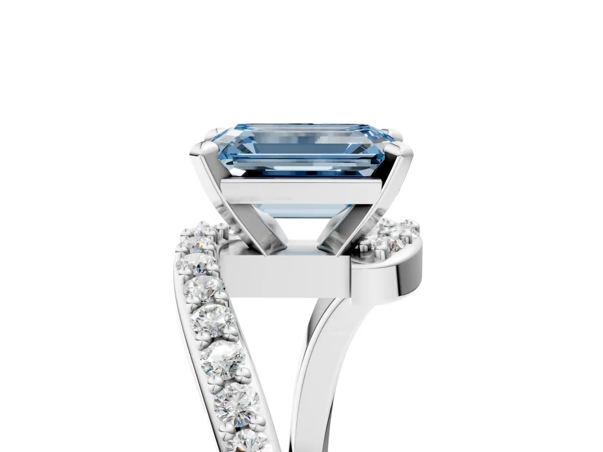 Fancy Blue Emerald Cut Solitaire Twist Band with Pave Set Diamonds and Four-Prong Setting Platinum