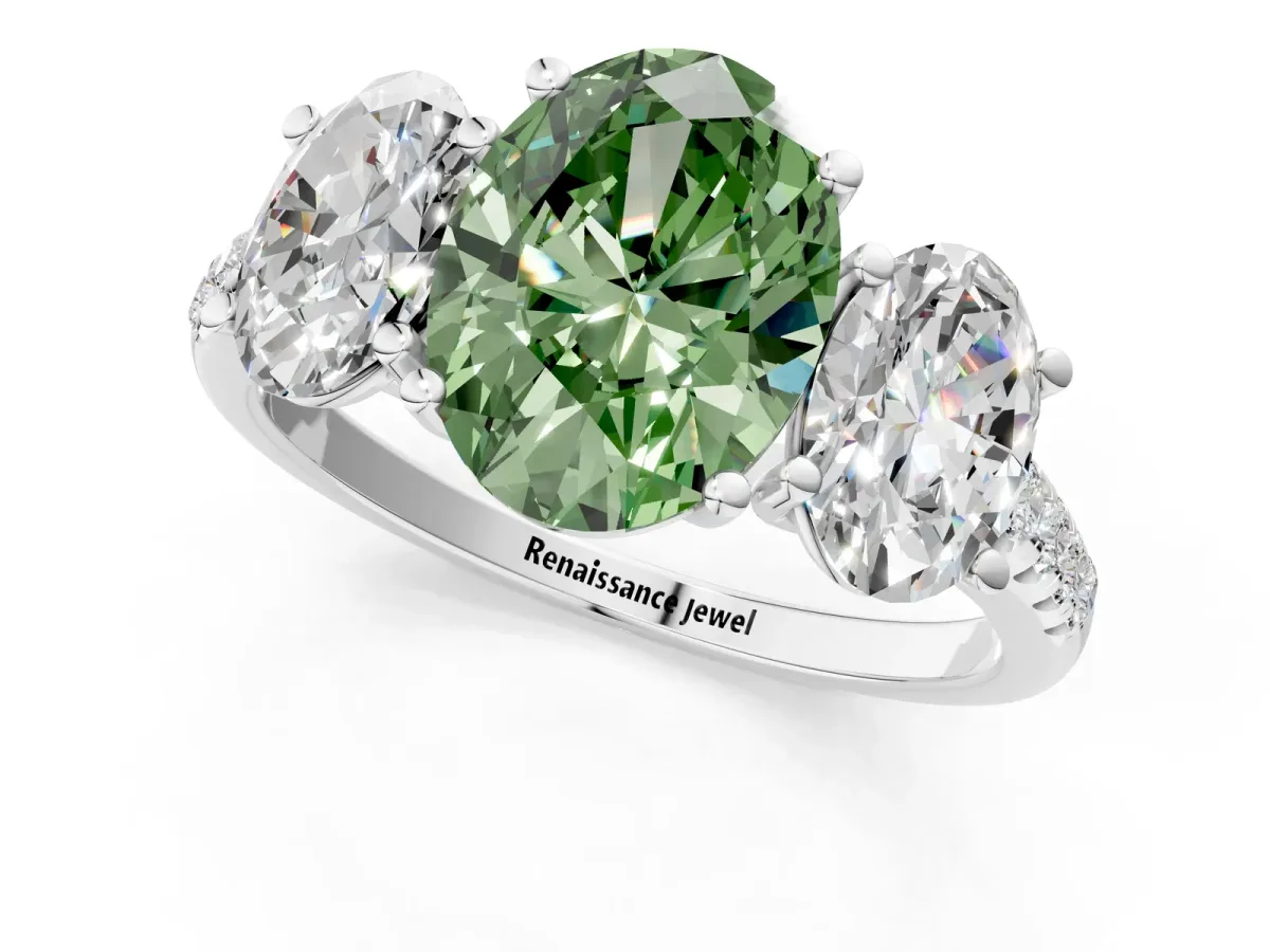 Fancy Green Three-Stone Oval Cut Diamond Ring with Round Pavé Band and Prong Setting Silver