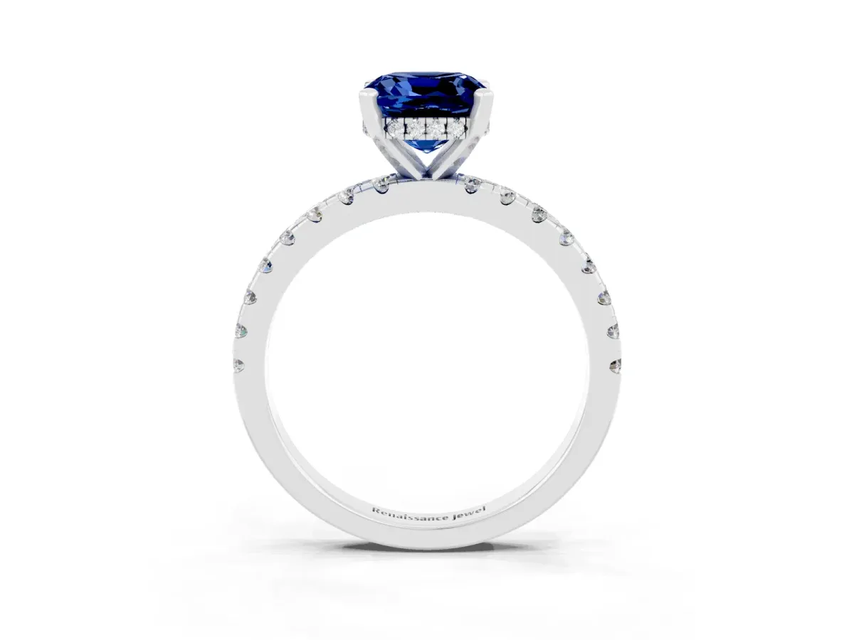 Cushion Cut Blue Sapphire Solitaire Ring with Round Pavé Band and Four-Prong Setting Silver