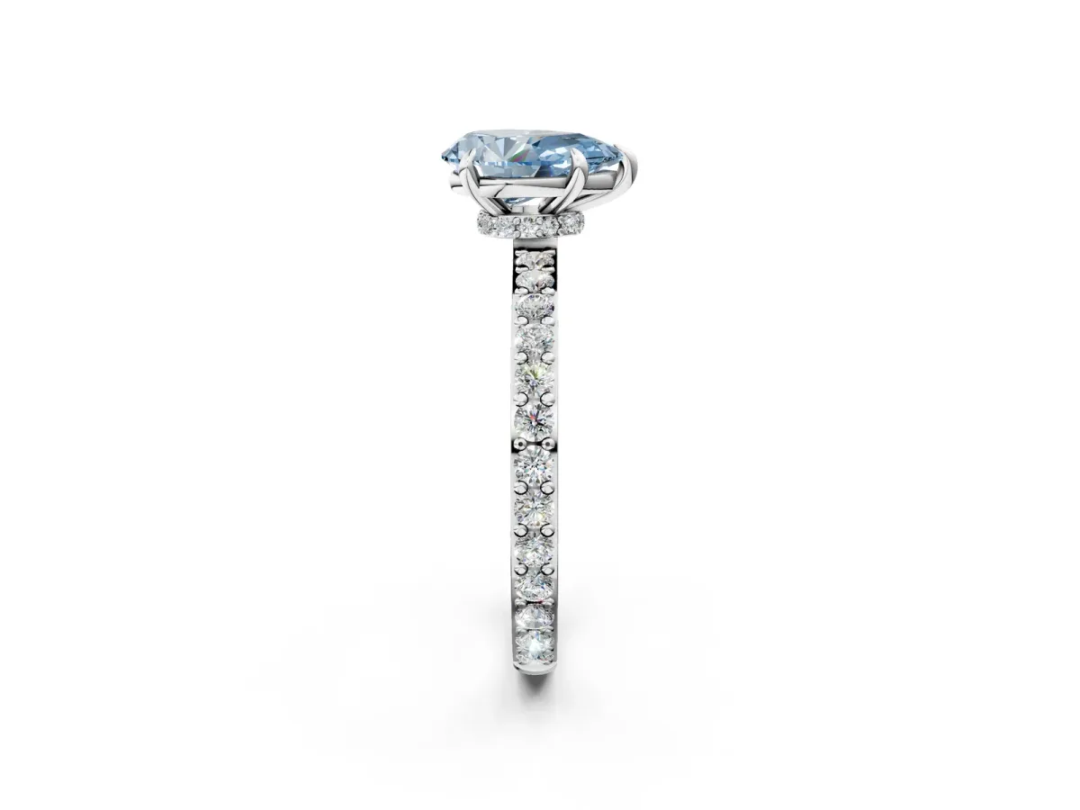 Fancy Blue Pear Cut Diamond Solitaire Engagement Ring with Pavé Band and Four-Prong Setting Silver
