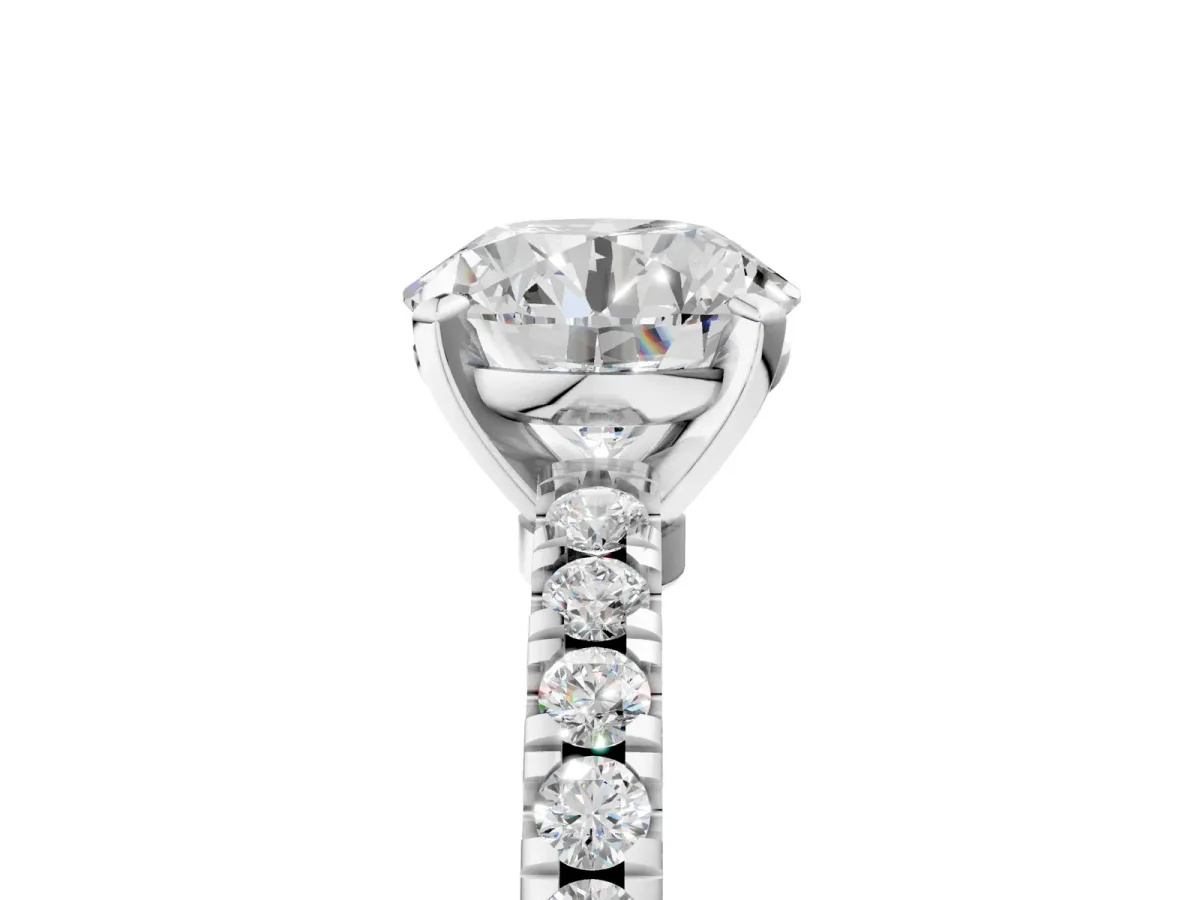 Round Cut Solitaire Diamond with Pavé Band and Four-Prong Setting Platinum