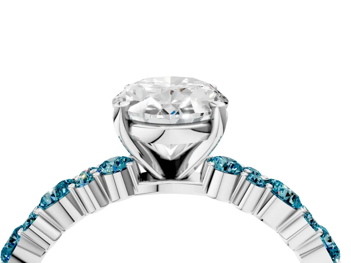 Oval Cut Diamond Side Stone Solitaire Ring with Round Blue Topaz and Four-Prong Setting White gold