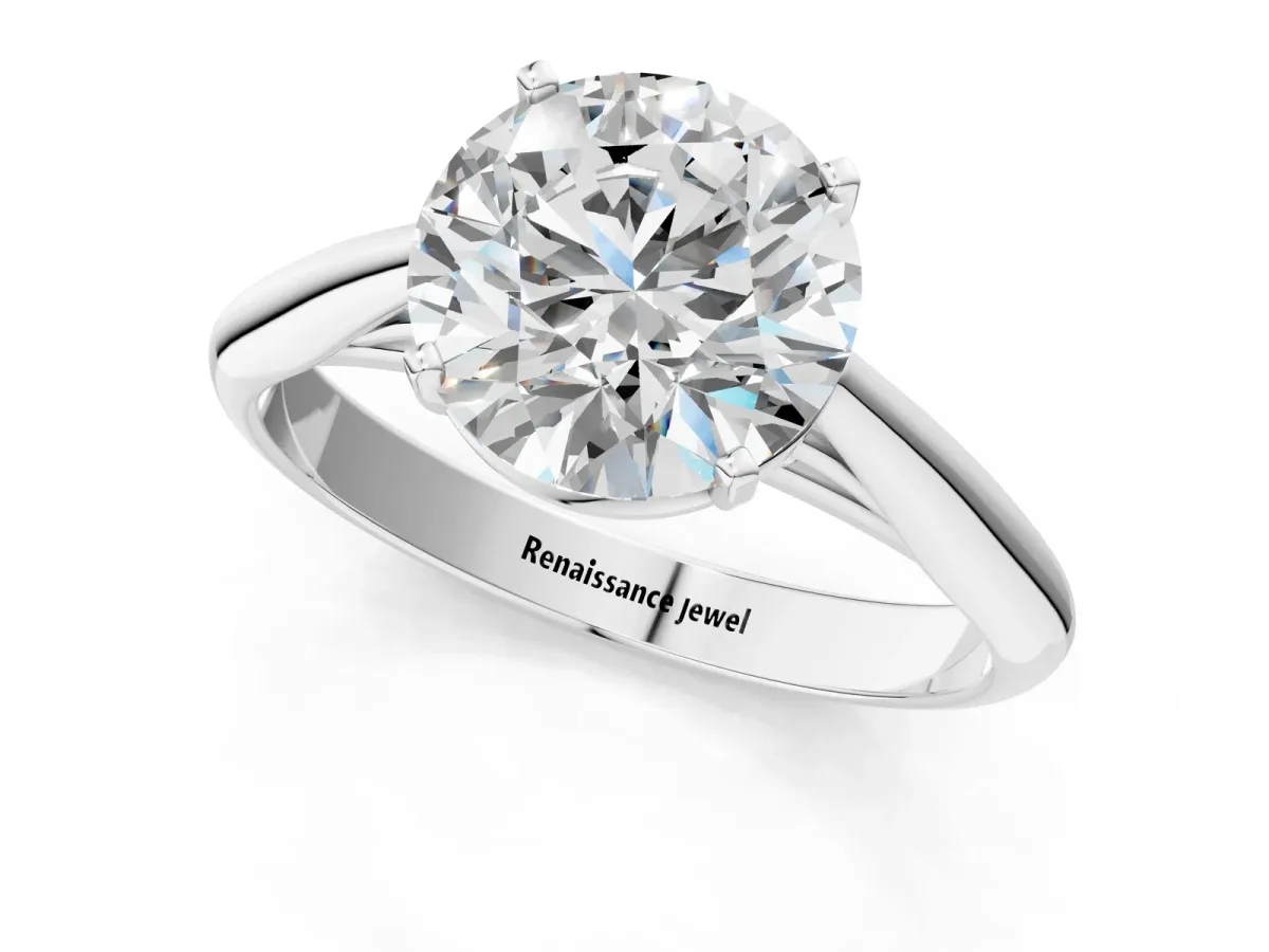 Round Cut Diamond Solitaire Engagement Ring with Cathedral Setting and Four-Prong Mount White gold