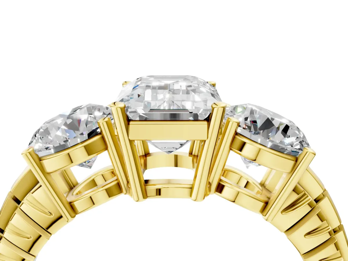 Three-Stone Emerald Cut Cut Diamond Ring with Channel-Set Band and Prong Setting Yellow gold