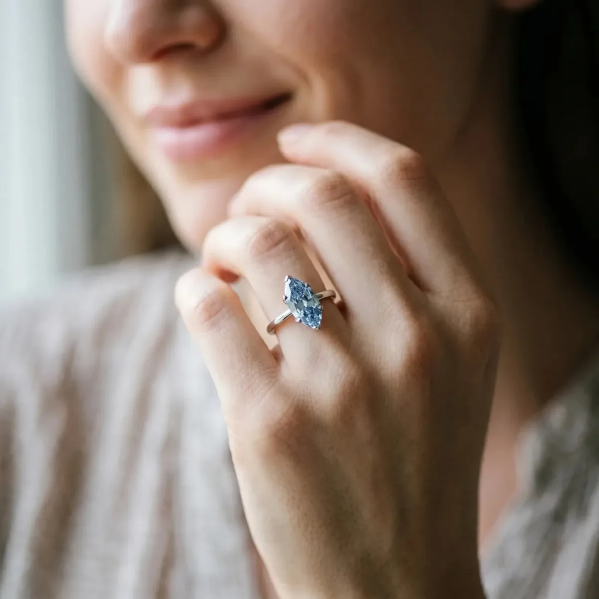 Fancy Blue Marquise Cut Diamond Solitaire Ring with Flower Prong Setting and Classic Band Silver