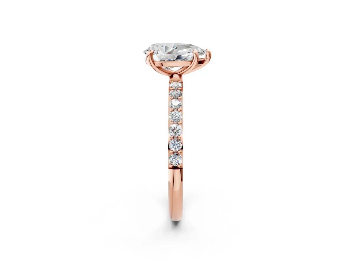 Pear Cut Diamond Solitaire Ring with Round Pavé Band and Prong Setting Rose gold