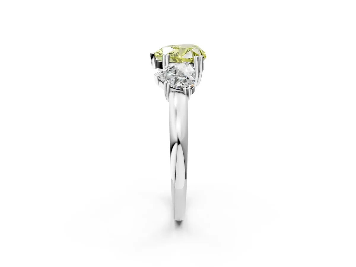Fancy Yellow Three-Stone Heart Cut Cut Diamond Ring with Channel Set Band and Four-Prong Setting Silver