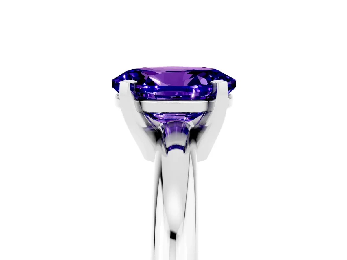 Oval Cut Tanzanite Solitaire Engagement Ring with Round Band and Four-Prong Setting Silver