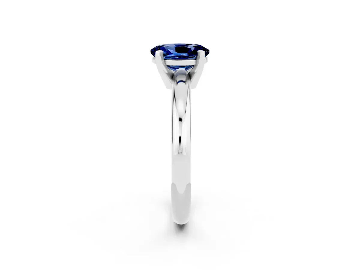 Oval Cut Blue Sapphire Solitaire Engagement Ring with Round Band and Four-Prong Setting Silver